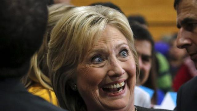 U.S. Democratic presidential candidate Hillary Clinton poses for a photo with supporters following a campaign rally in Manchester, New Hampshire, February 3, 2016. REUTERS/Carlo Allegri